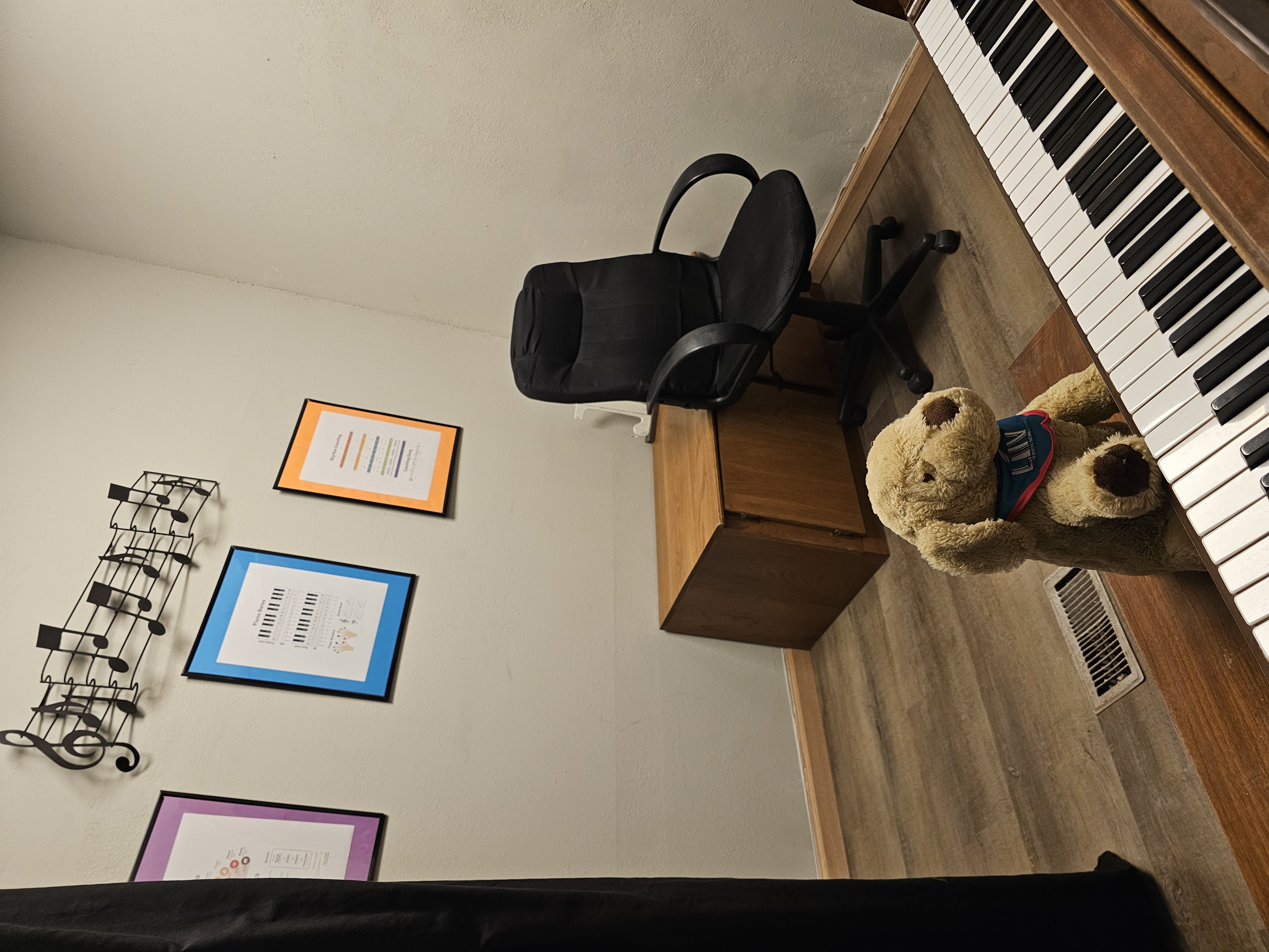 One of our piano lesson rooms, decorated with music themed art.